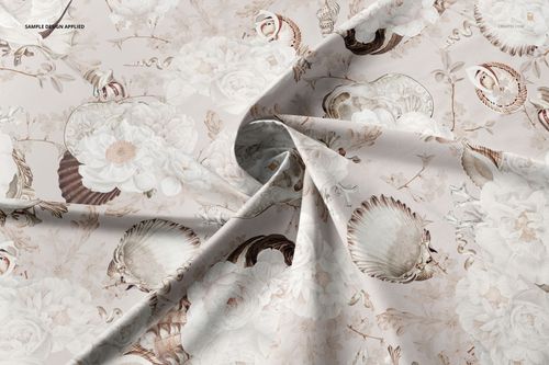 Twisted cotton fabric mockup with a floral and seashell pattern, shown from a top view with soft beige tones.