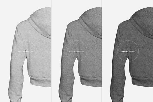 PSD mockup featuring the rear side of three gray melange crop hoodies in varying shades, arranged side by side.