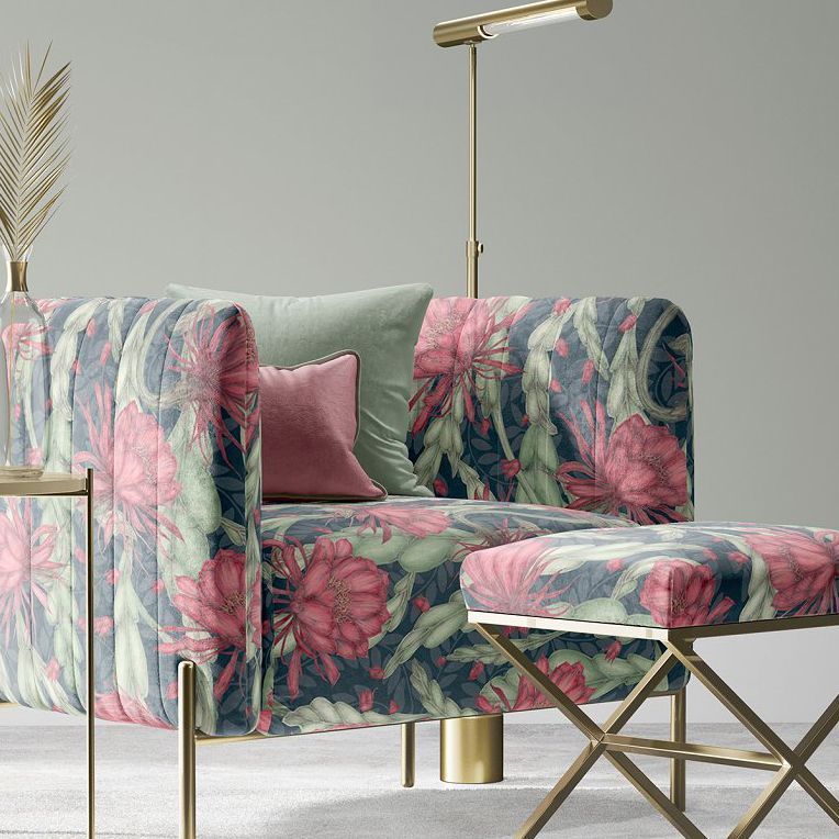 Velvet armchair and stool mockup featuring a bold floral pattern in pink and green, set in a modern living space with gold accents.