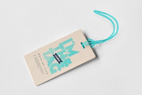 Front view of a luggage tag mockup with turquoise text and strap, placed on a clean white surface for presentation.