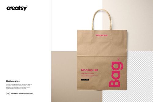 Natural kraft paper shopping bag mockup shown upright with rope handles, featuring printed text and a neutral backdrop.