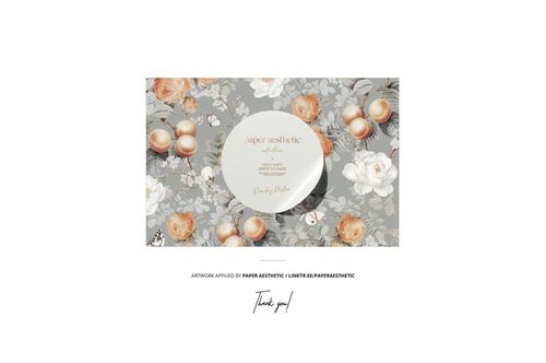 French kitchen design mockup featuring a round plate on a floral patterned surface in soft gray and orange tones.