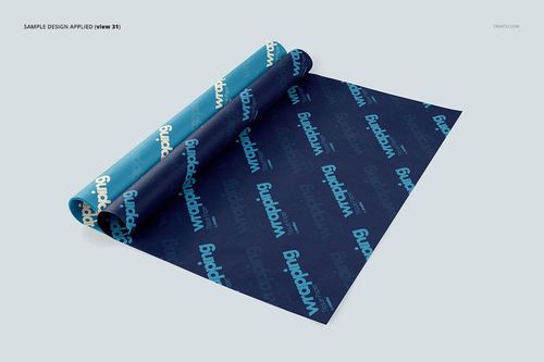 Wrapping tissue paper mockup featuring two sheets in blue tones with repeating text pattern, shown from a top angle.