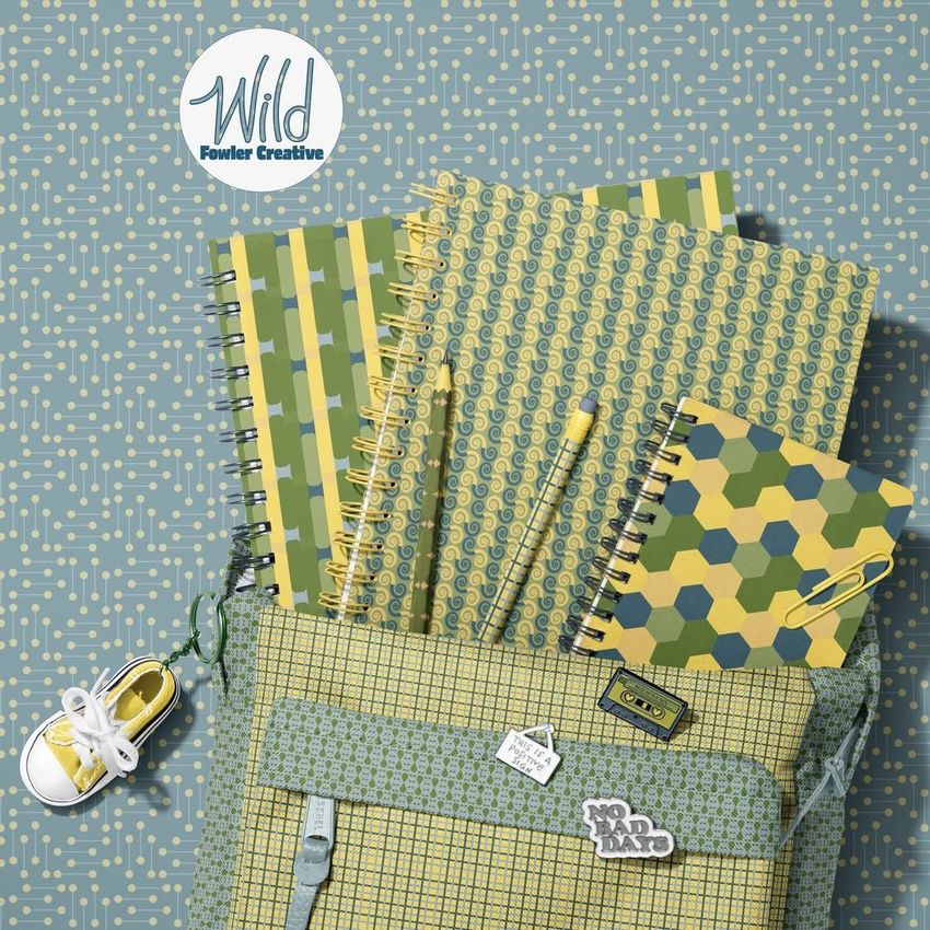 School backpack mockup with spiral notebooks in geometric green and yellow patterns, pens, and a small sneaker keychain.