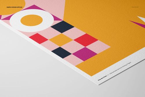 A3 fine art print mockup featuring a geometric abstract design in yellow, pink, white, and black, shown at an angle.