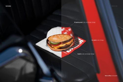 PSD mockup showing a burger on a grid-patterned wrapper and napkin, resting on a black car seat with red door trim.