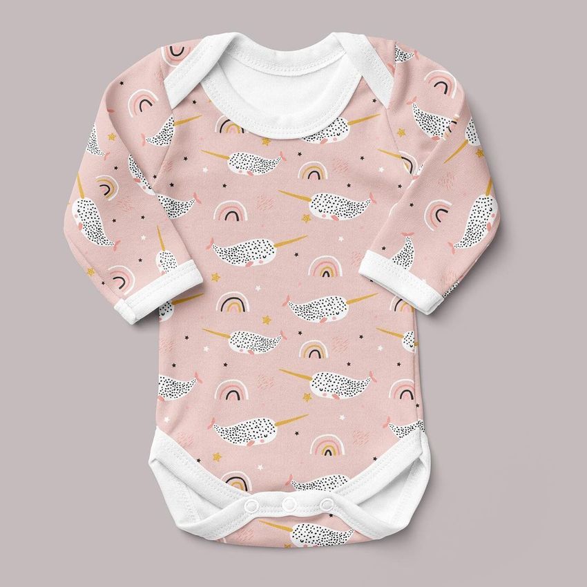 Baby long sleeve bodysuit mockup featuring a pink fabric with playful narwhal and rainbow patterns, shown on a neutral background.