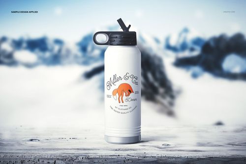 Front view of a white water bottle mockup with black lid, custom logo, and blurred snowy mountain background.