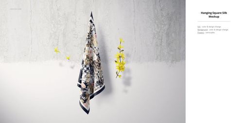 Square silk fabric mockup displayed hanging, featuring a mix of black, beige, and floral designs, with yellow flowers nearby.