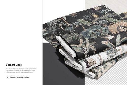 Three fabric bolts featuring leafy and floral designs in earthy colors, displayed in a PSD mockup on a diagonal surface.