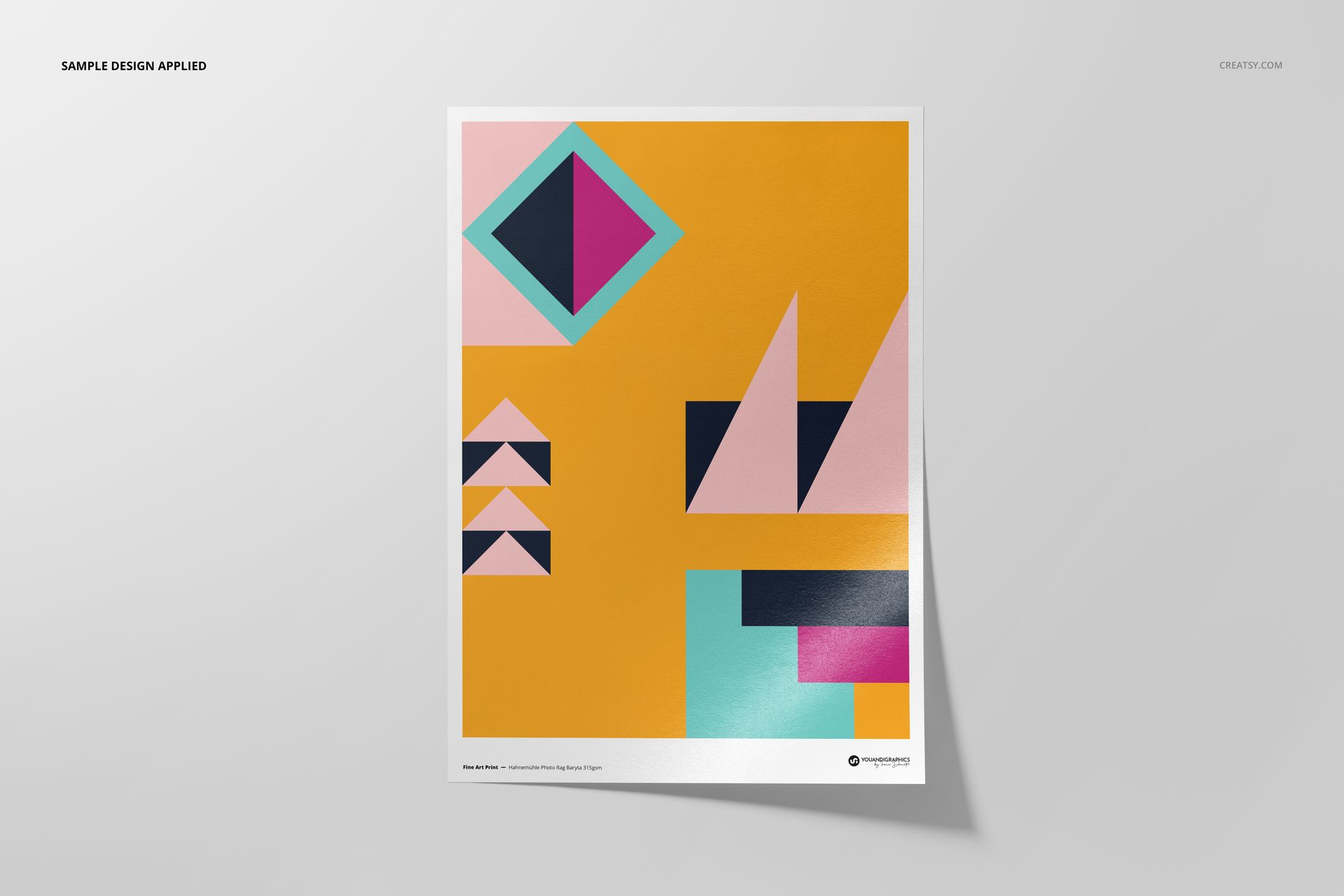A3 fine art print mockup featuring geometric shapes in pink, teal, black, and yellow on a white-bordered paper.