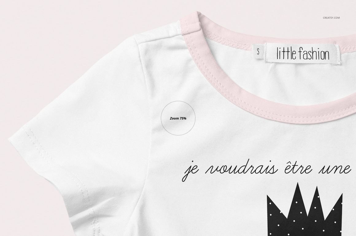 Front view close-up of a girls T-shirt mockup featuring white fabric with light pink collar and printed design.