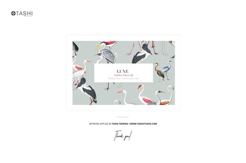 Front view of satin fabric stack mockup with various birds illustrated on a pale gray surface.