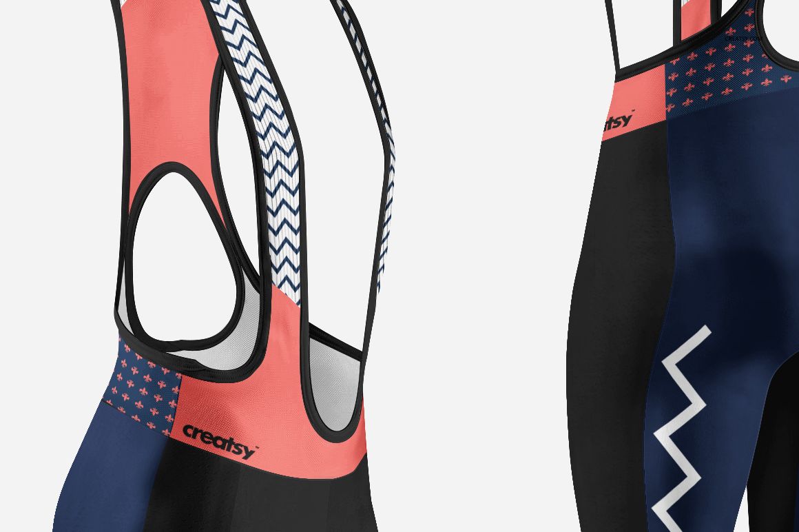 Bib shorts PSD mockup showing close-up details of coral, navy, and white sections with geometric accents.