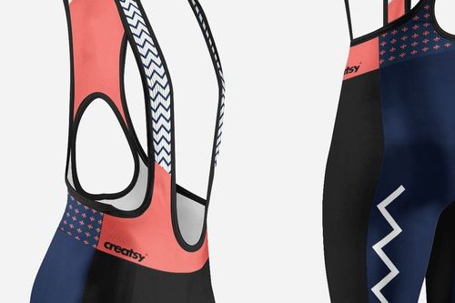 Bib shorts PSD mockup showing close-up details of coral, navy, and white sections with geometric accents.