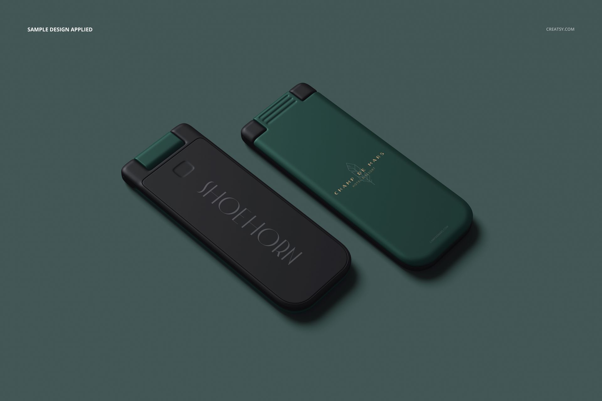 PSD mockup of folding lint brush and shoe horn set in closed position, matte finish, dark tones, viewed from above.