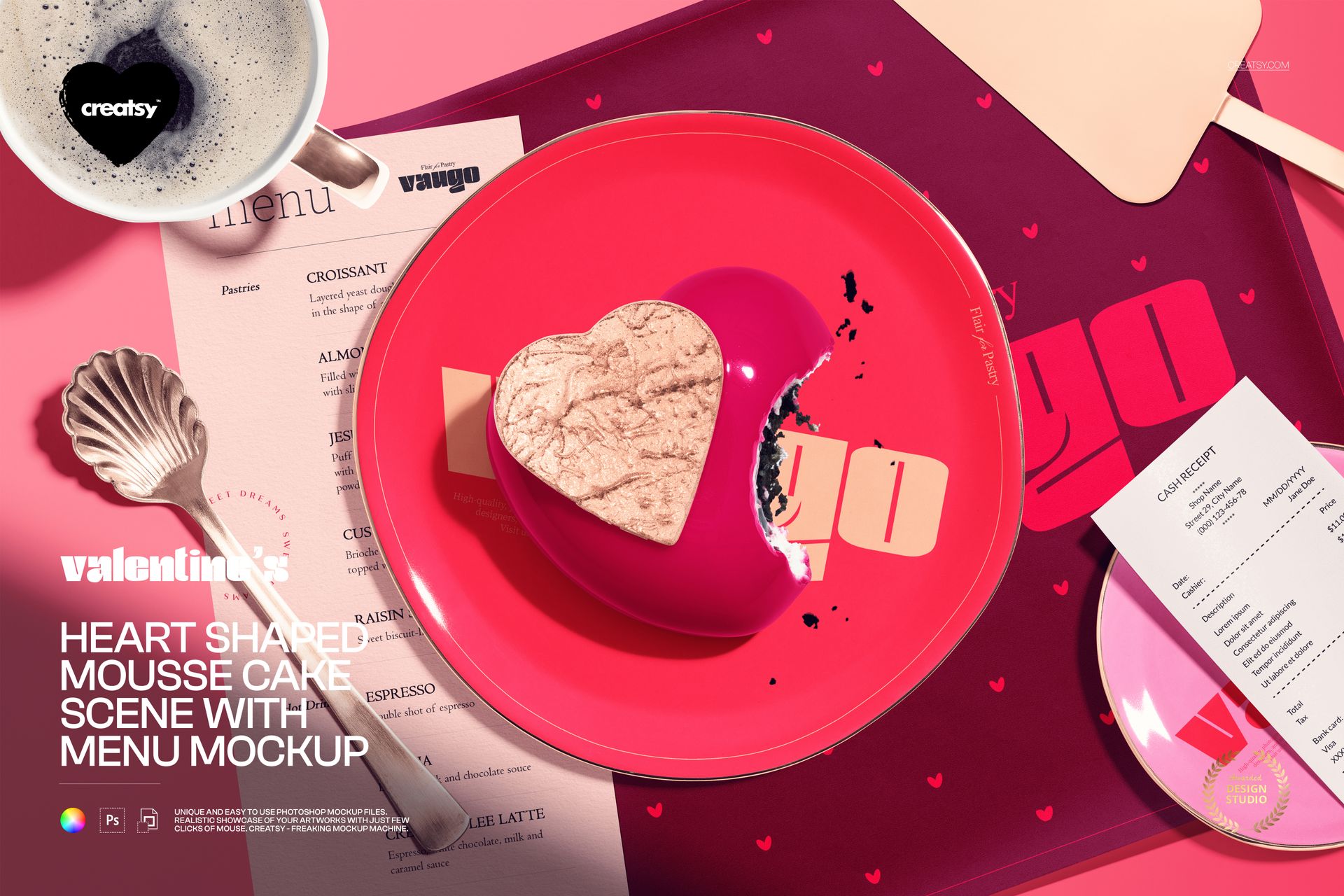 Heart shaped mousse cake with pink glaze on a red plate, surrounded by a menu, spoon, and pink tableware in a top view scene.