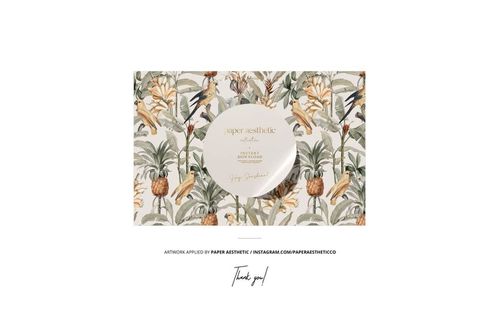 Cotton fabric bolt mockup shown from the front, decorated with a detailed nature-inspired print and neutral background.