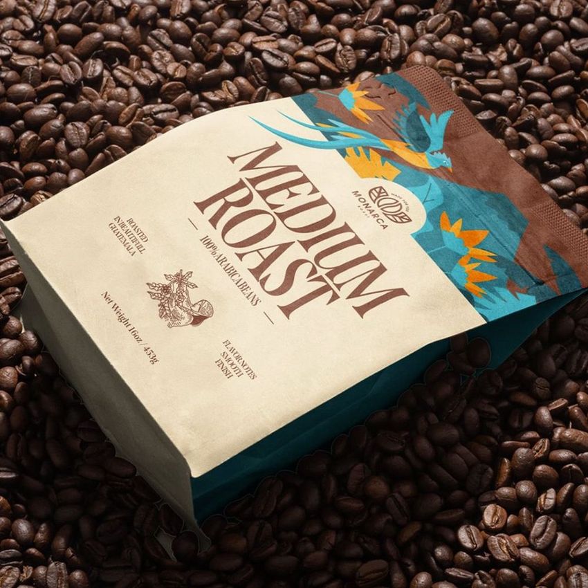 Coffee bag mockup featuring a beige and brown package with bold text and colorful bird illustrations, surrounded by coffee beans.