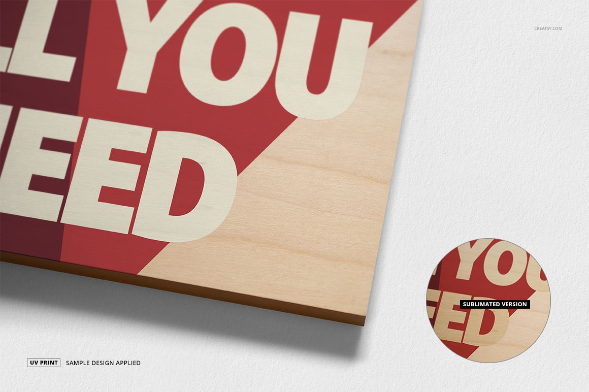 Wood plaque wall art mockup showing a close-up of a rectangular plaque with bold cream text on a red geometric background.