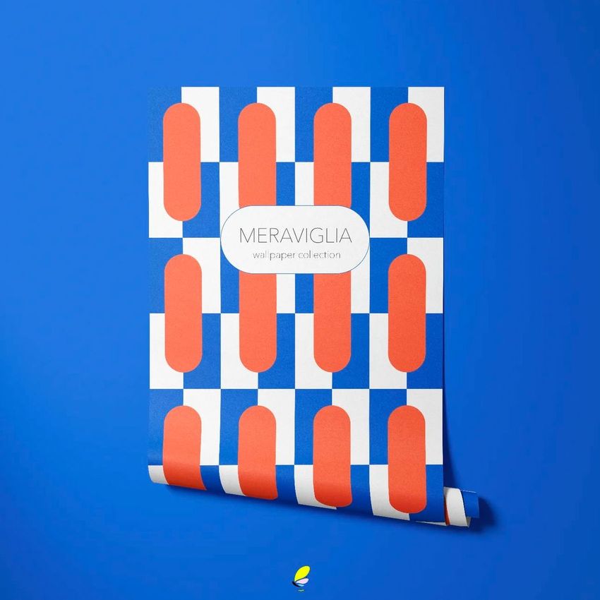 Paper wallpaper mockup featuring a geometric pattern with blue and white squares and red oval shapes on a blue background.