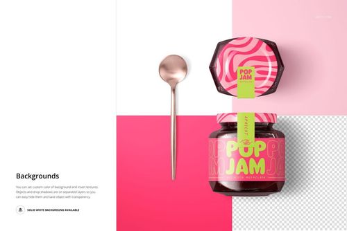 PSD mockup of a blackberry jam jar with vibrant pink design, displayed alongside a spoon on a split color backdrop.