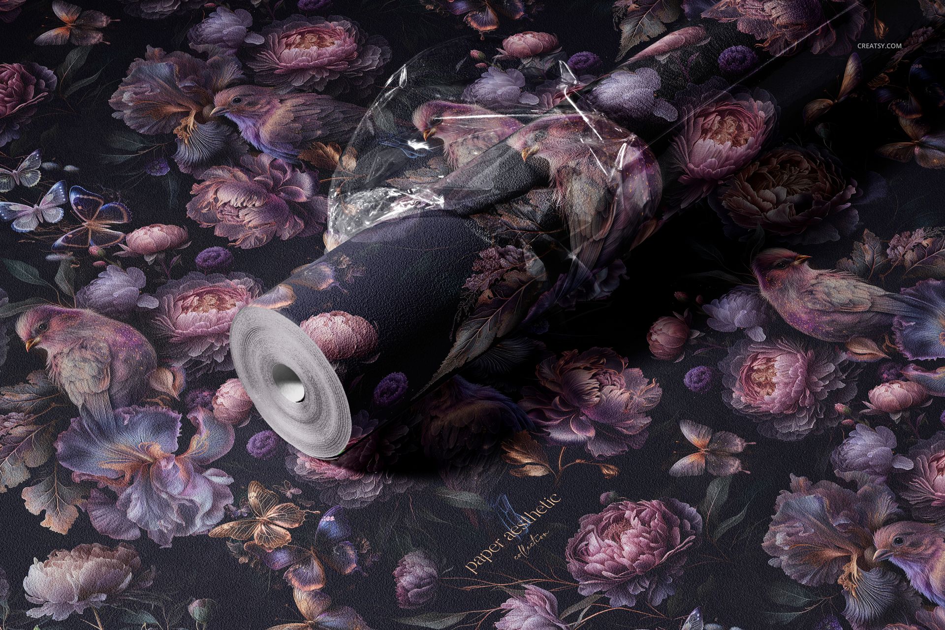 Mockup of non-woven vinyl wallpaper roll with intricate purple floral and bird design, viewed from above.