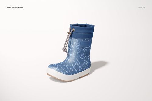 Children’s rain boot mockup featuring a blue shaft, white sole, and subtle raindrop design, displayed at an angle.
