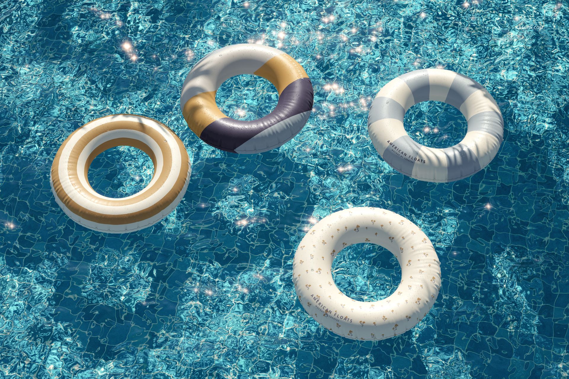 PSD mockup showing four distinct swim rings on the surface of a sparkling blue pool, captured overhead.