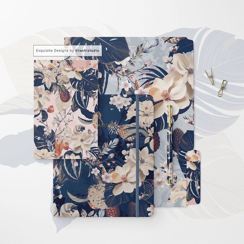 Stationery set mockup featuring a notebook, folder, and card with a blue and beige floral pattern, arranged on a white surface.