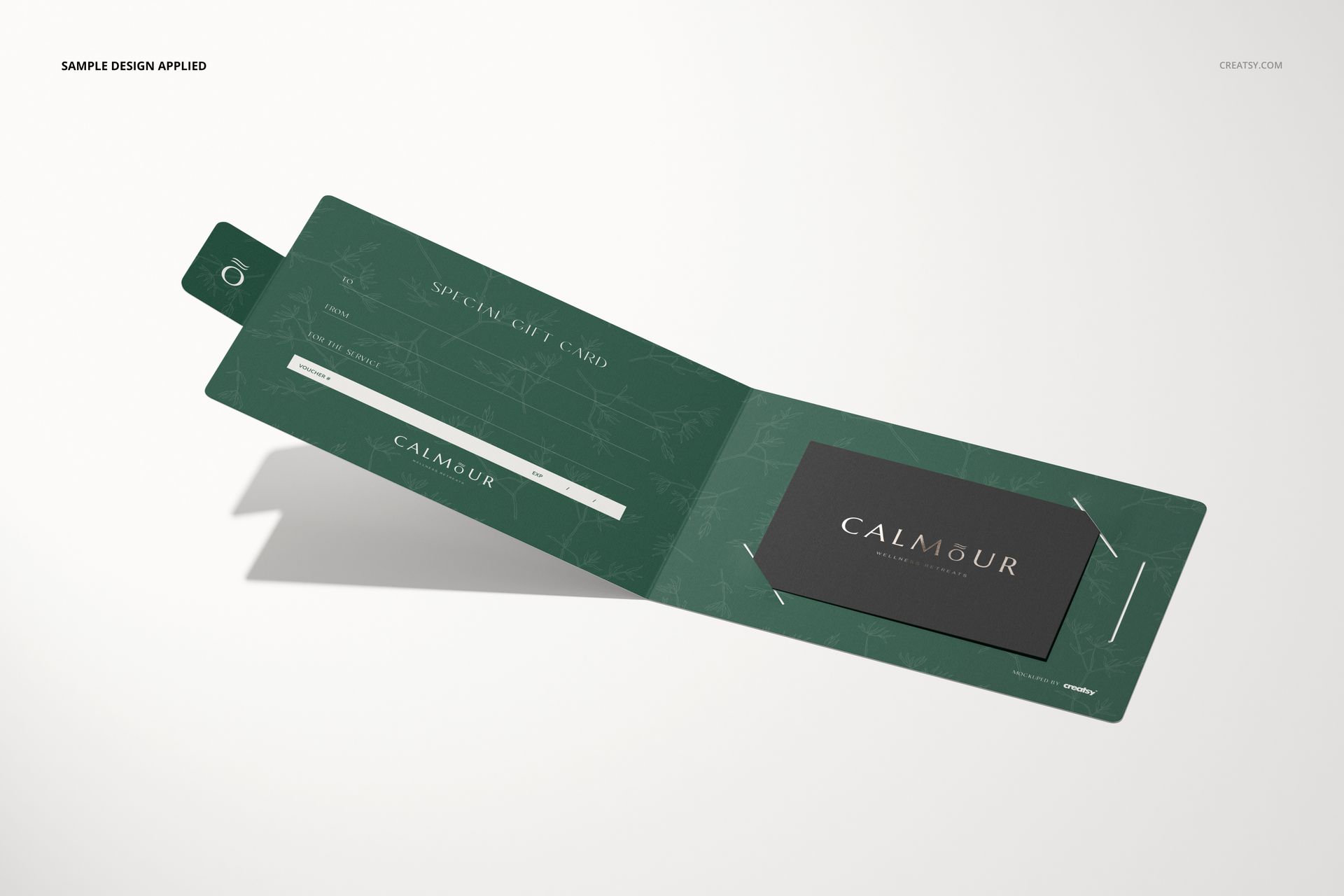 Open gift card holder mockup displaying a dark green card holder with subtle line patterns and a black gift card.