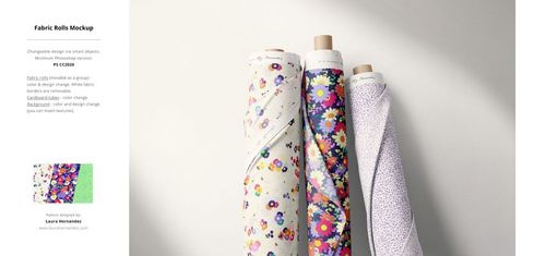 Three fabric rolls with colorful floral and dotted patterns displayed upright against a light background, front view.