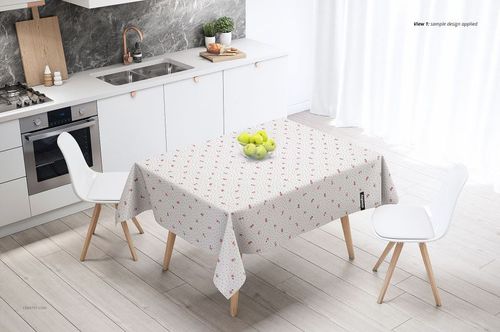 Kitchen scene featuring a table covered with a light-colored tablecloth with small red motifs, PSD mockup style.