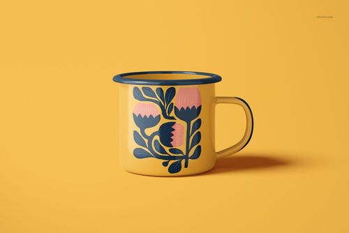 PSD mockup of a yellow enamel mug decorated with stylized blue and pink flowers, displayed on a matching yellow surface.