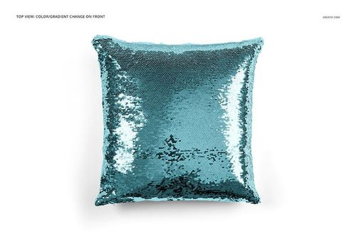 PSD mockup of a square pillow featuring sparkling blue mermaid sequins, top-down perspective on white backdrop.