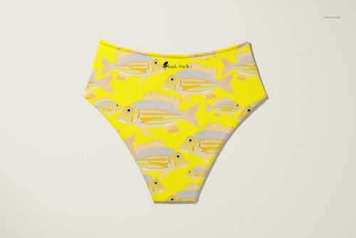High waisted bikini bottom mockup featuring a yellow fabric with a repeating fish pattern, front view on a neutral background.