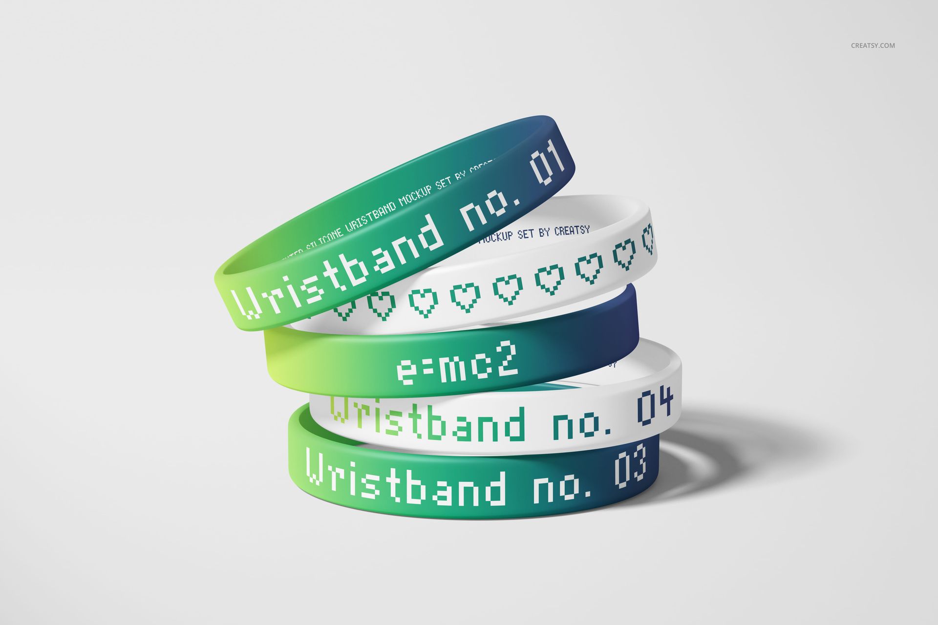Four silicone wristbands mockup with gradient blue and green colors, white bands, and various printed designs, arranged in a pile.