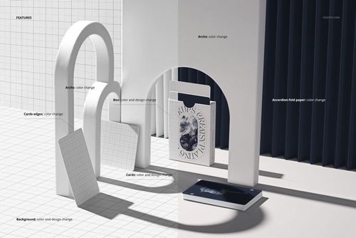 PSD mockup showing card deck, tuck box, and loose cards in a clean, architectural setting with strong shadow lighting.