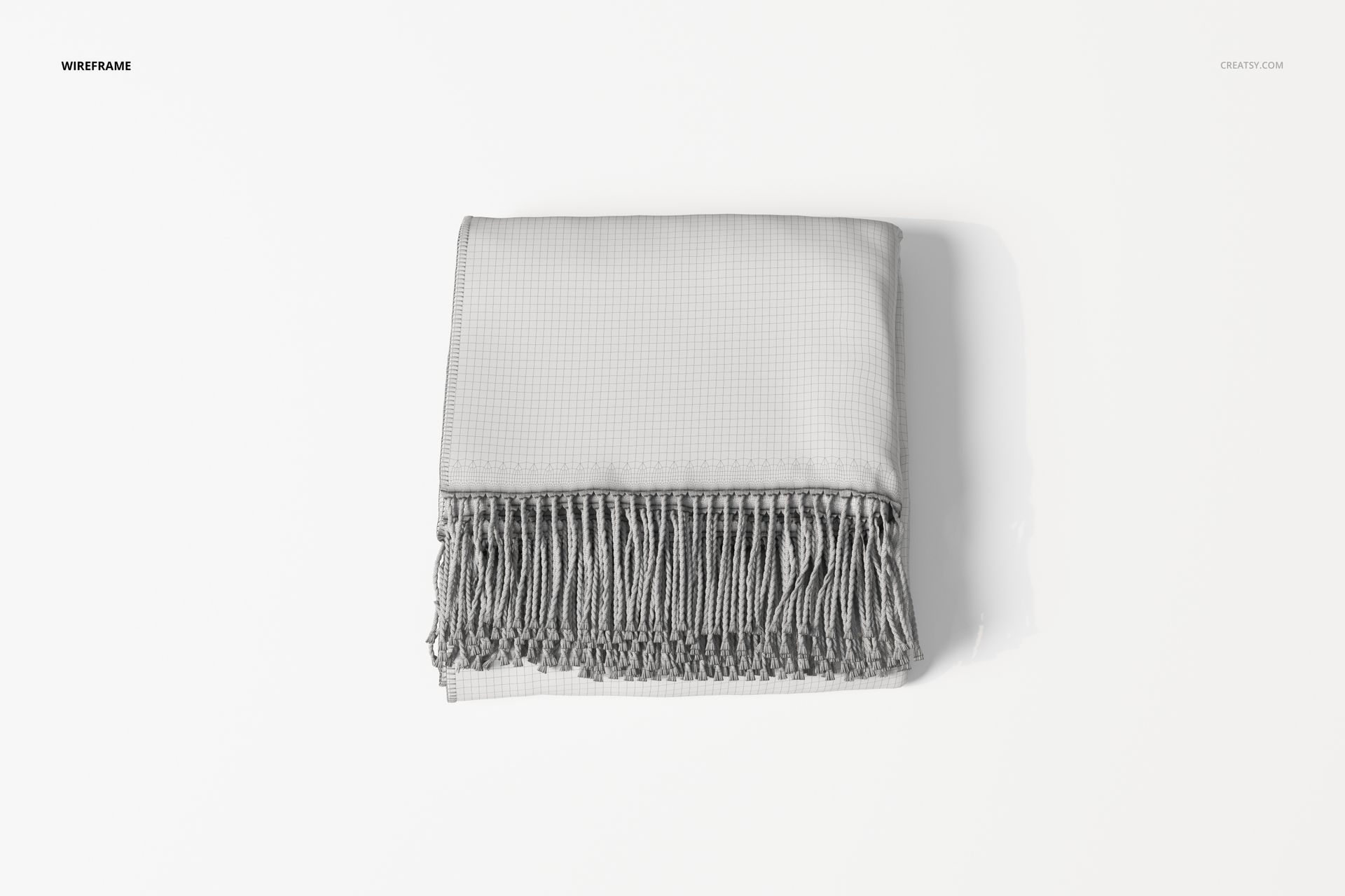 Folded throw blanket in light gray color with a subtle grid pattern and fringed edges, viewed from above on a white surface.