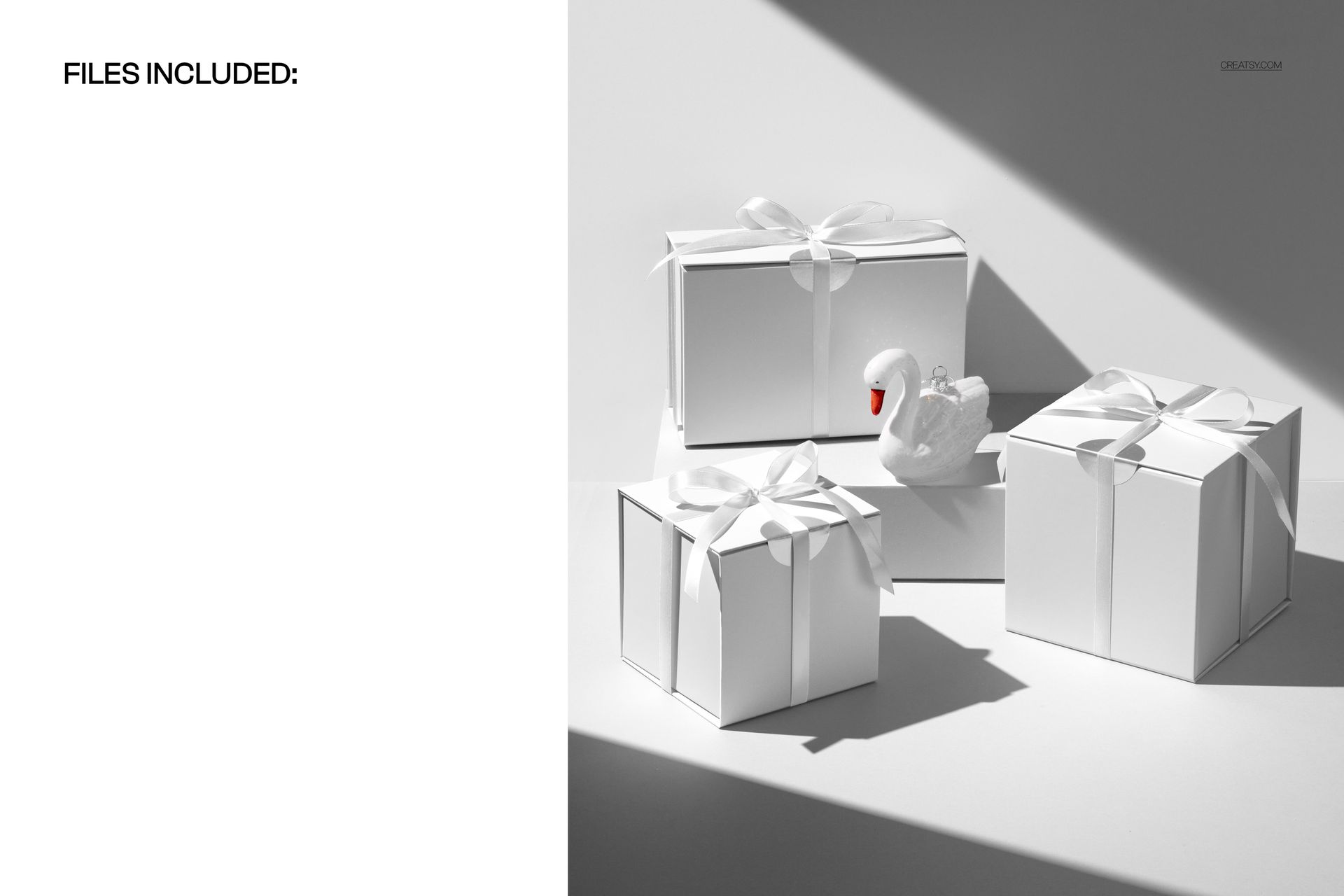 Three white magnetic gift boxes with ribbon displayed in a festive Christmas setting with a decorative swan, PSD mockup.