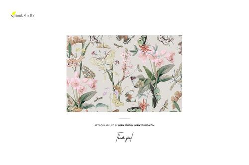 Front view of a wallpaper mockup featuring a classical floral and butterfly pattern on a light background.