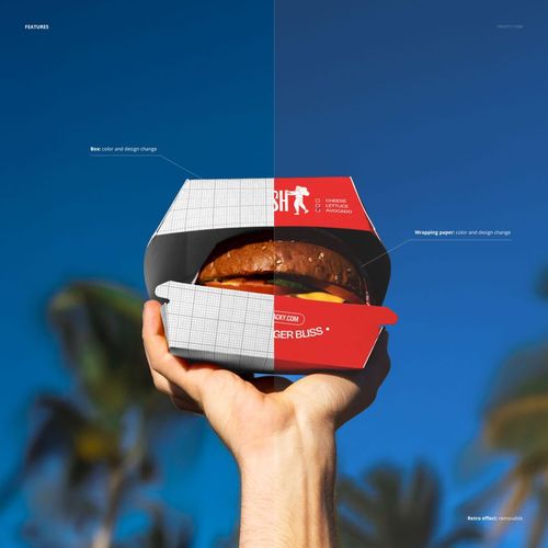 Hand holding a burger box packaging against a blue sky with palm trees, showing a split design for a PSD mockup.
