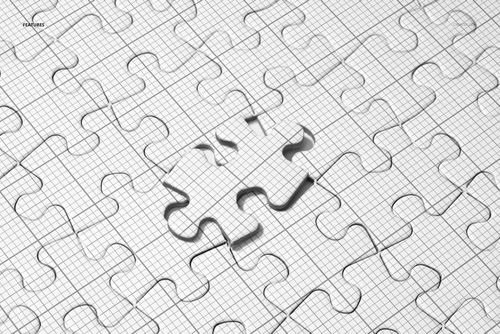 Top view of a heart jigsaw puzzle mockup with grid lines and one piece removed, showing shadow details.