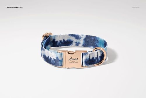 Blue and white patterned dog collar mockup featuring a gold clasp and engraved text, shown from a front angle.