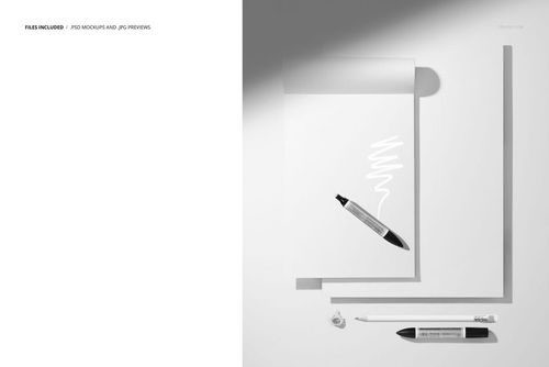 Flat lay of blank paper pads, a black marker, and a white pencil on a minimalist light gray background, PSD mockup.