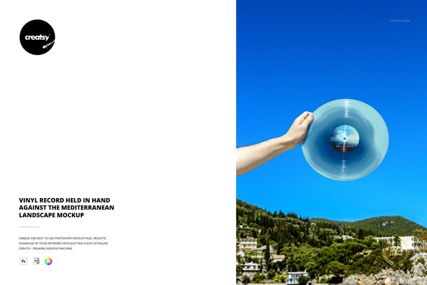 Vinyl Record Held in Hand Against the Mediterranean Landscape Mockup - mockup screenshot 1