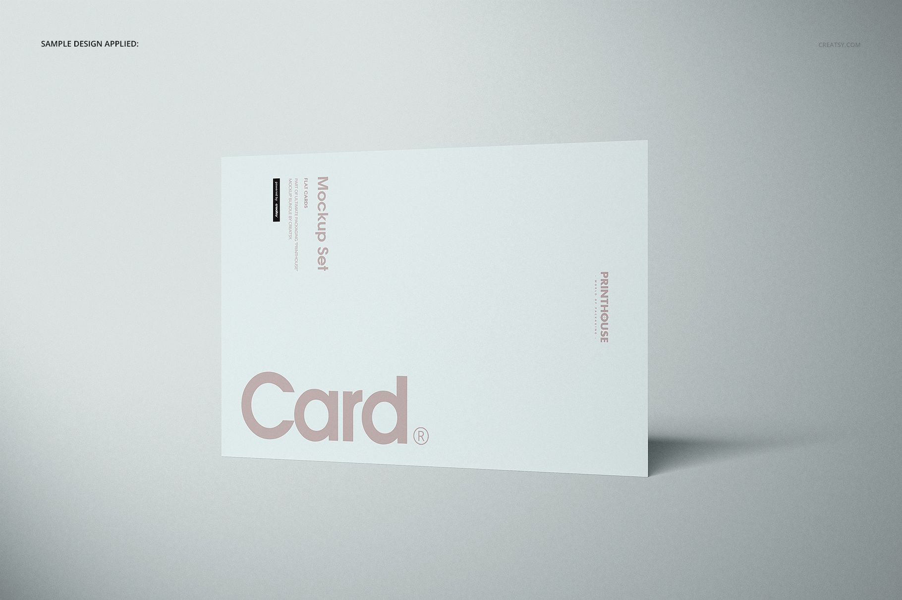 Flat card mockup displayed at an angle on a light gray background, featuring minimal text and clean layout.