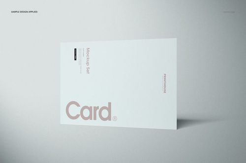 Flat card mockup displayed at an angle on a light gray background, featuring minimal text and clean layout.