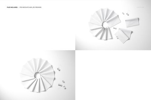 PSD mockup displaying assorted folded fabric swatches in different shapes with sewing accessories on a white tabletop.