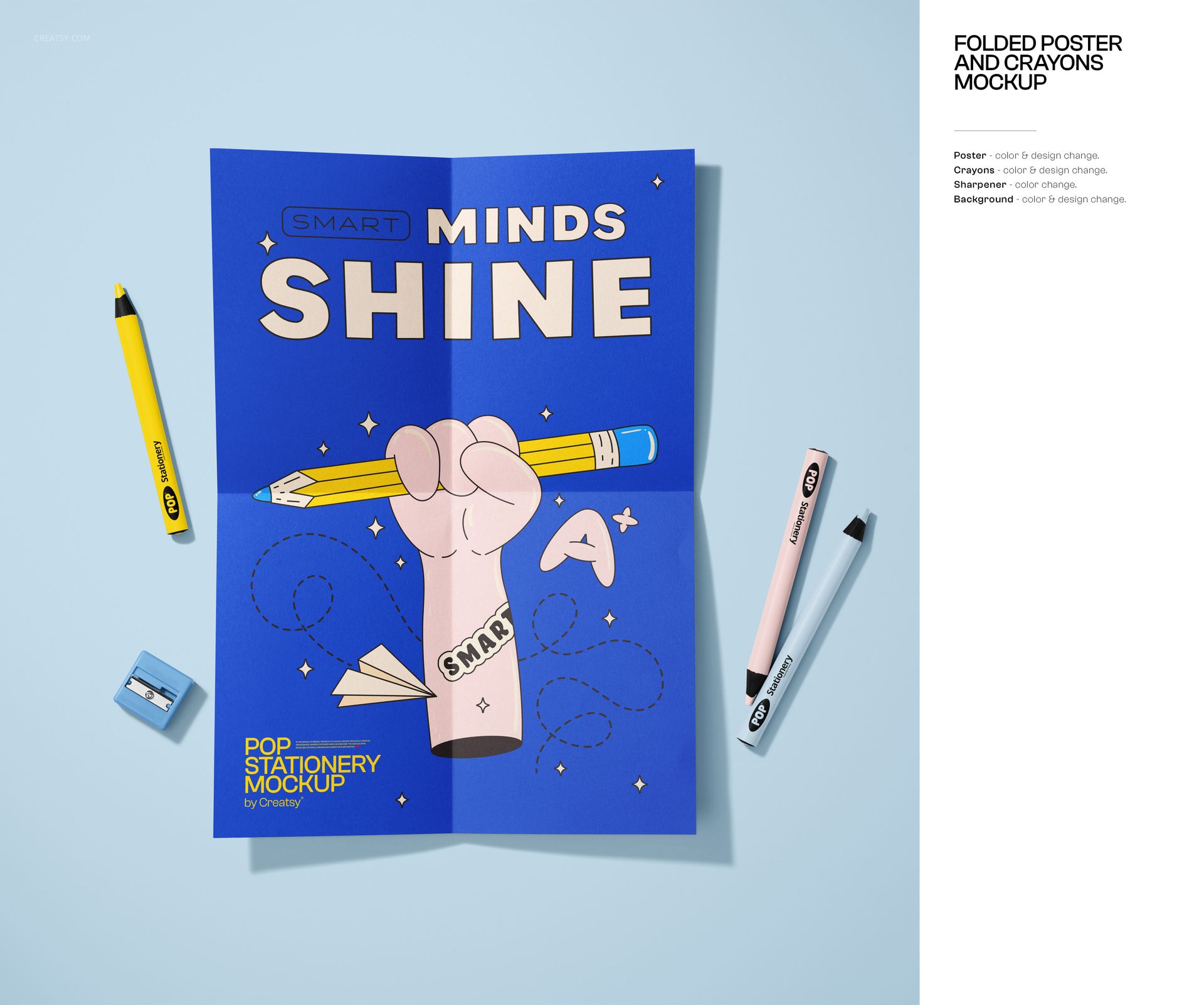 Stationery mockup scene with a colorful poster, crayons, pencil sharpener, and eraser arranged on a flat blue surface.
